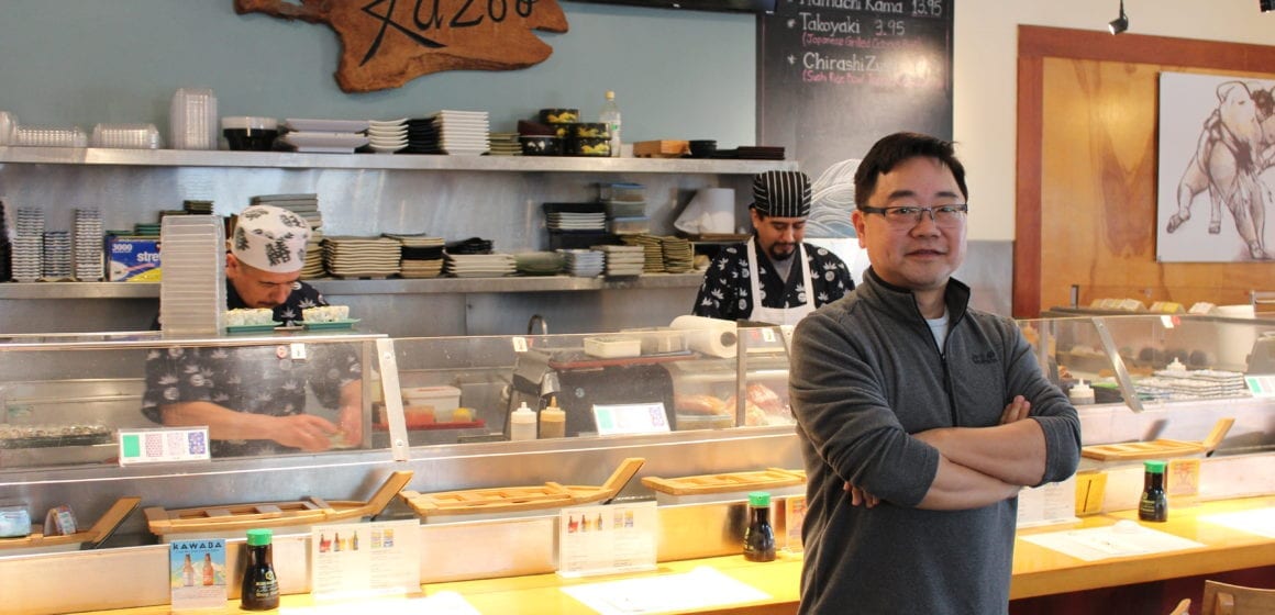 Man standing in restaurant