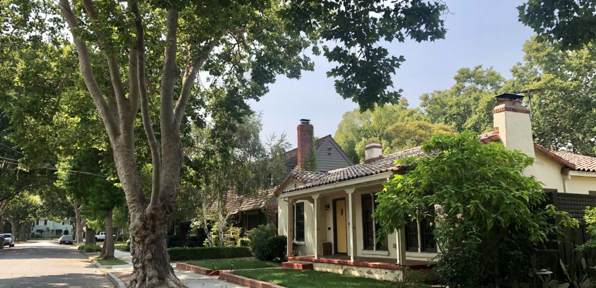 A single-family home on a tree-lined street in the Willow Glen neighborhood of San jose