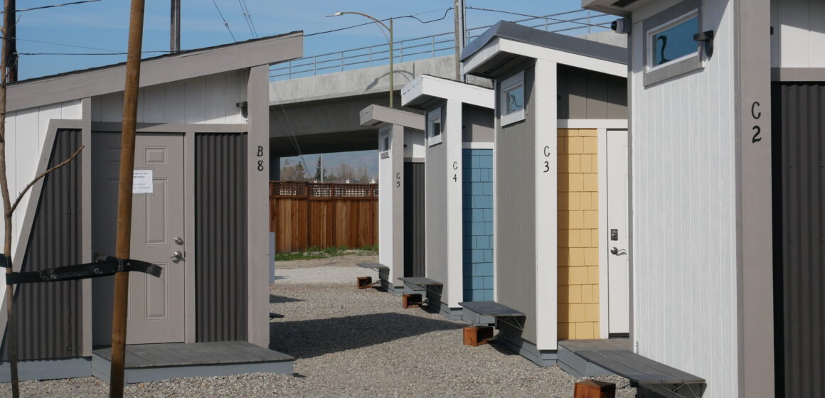 A row of tiny homes for formerly homeless people