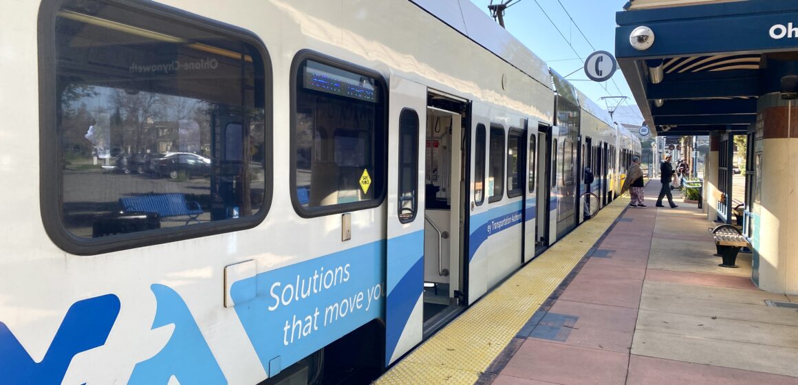 Passengers boarding VTA light rail train