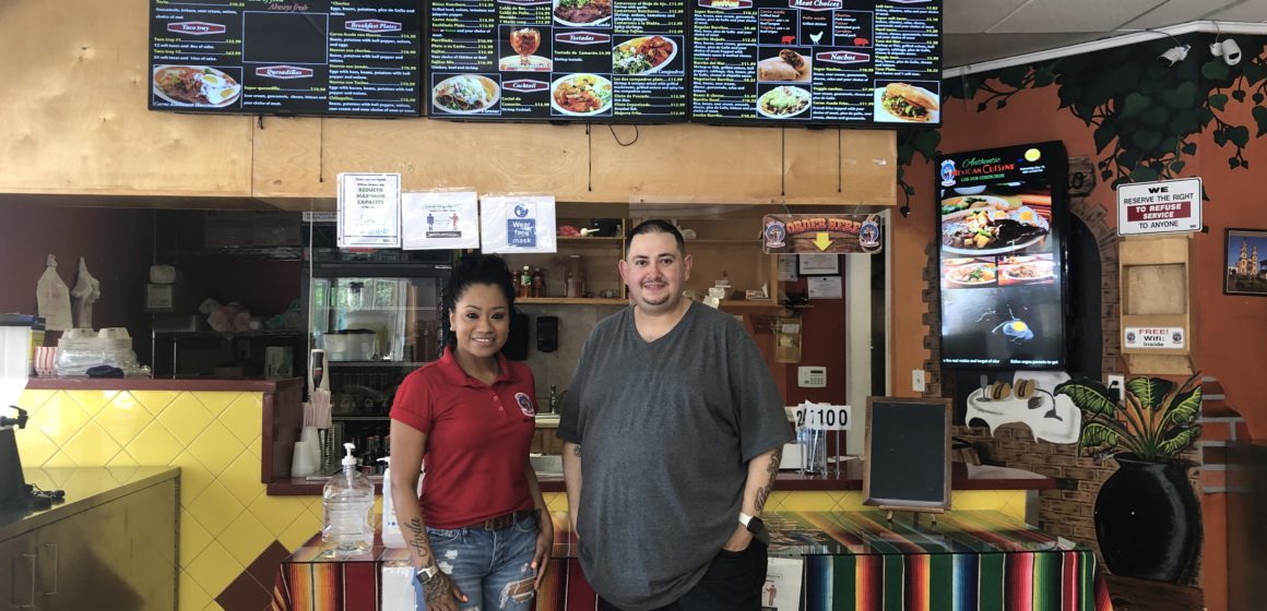 Diana Abila and Cesar Angulo at their restaurant, Los Dos Compadres, at the end of their day. Photo by Patricia Wei.