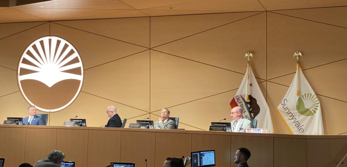 Sunnyvale Mayor Larry Klein and Councilmembers Russ Melton, Murali Srinivasan and Richard Mehlinger sitting behind the dais at city hall.