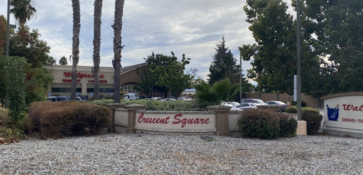 Crescent Square commercial space sign with local Walgreens in background