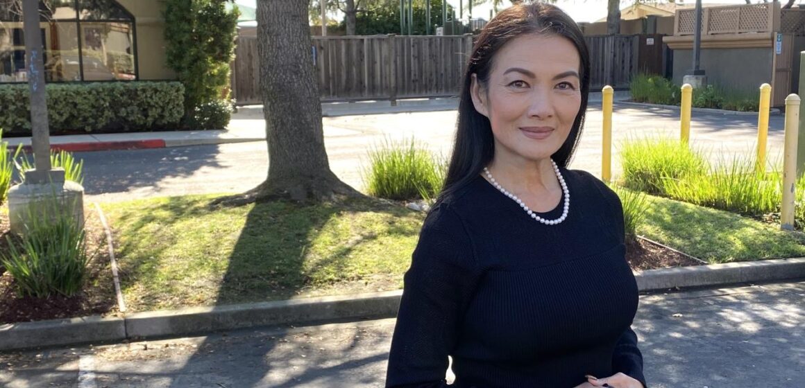 Milpitas City Councilmember Hon Lien poses in a parking lot