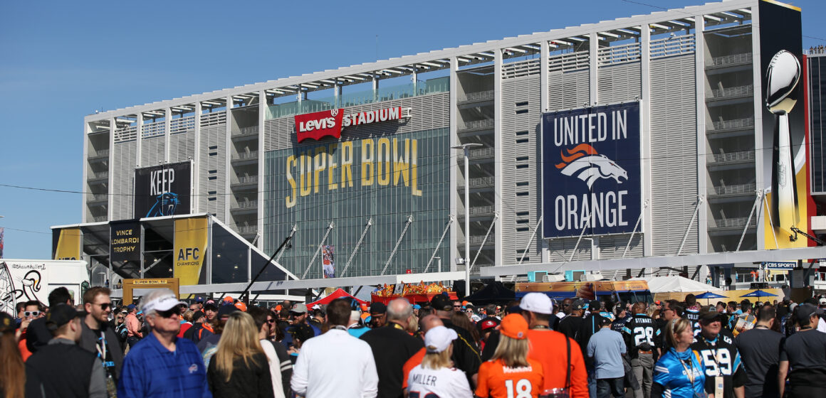 A crowd of people outside Levi's Stadium in Santa Clara during the 2016 Super Bowl.