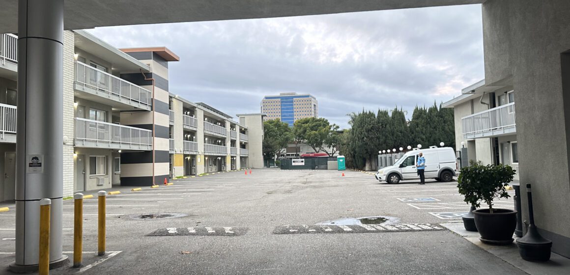 The parking lot of a motel in San Jose