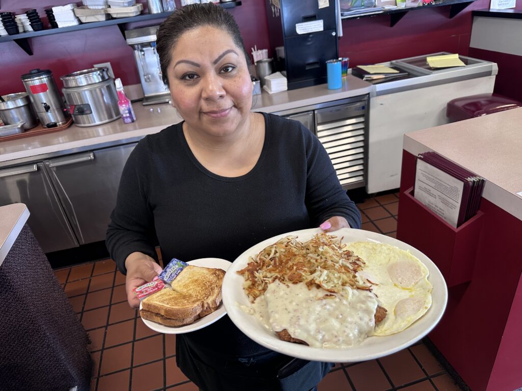 Antonia Reyes with chicken fried steak. Photos by Robert Eliason.