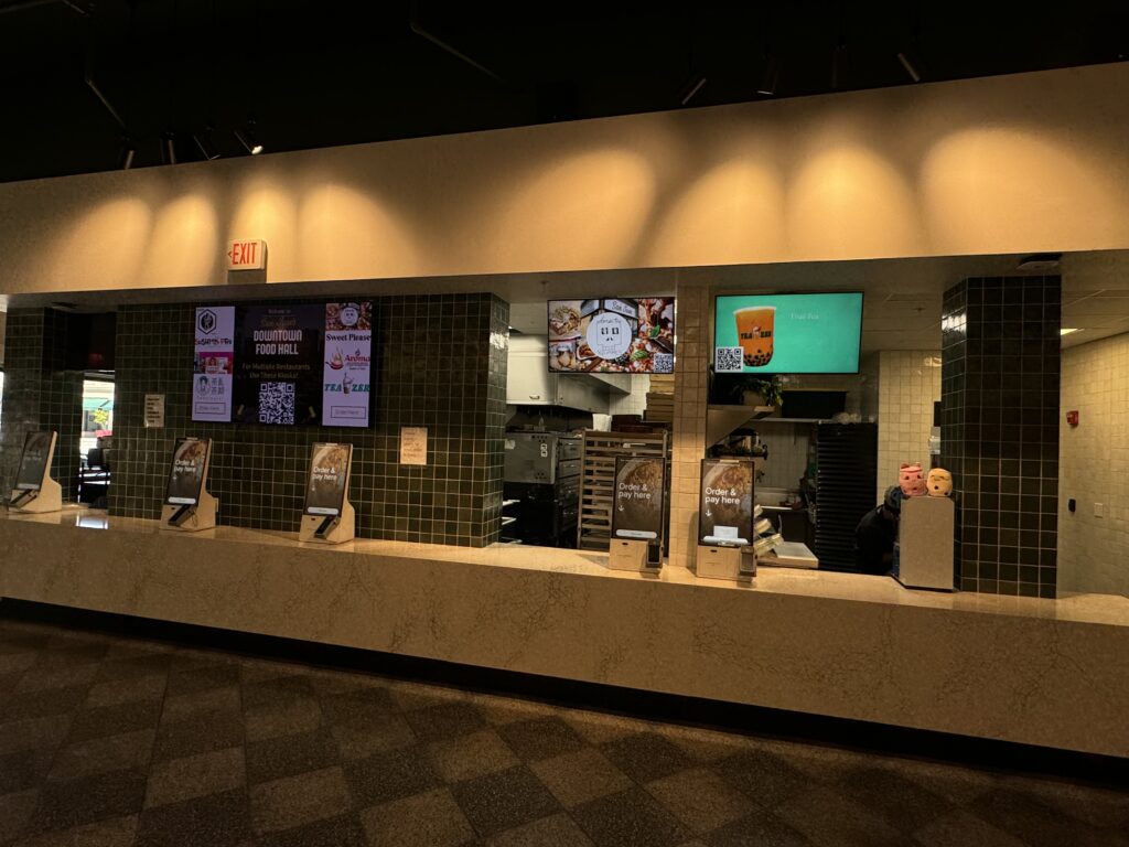 The interior of a lobby of a food hall