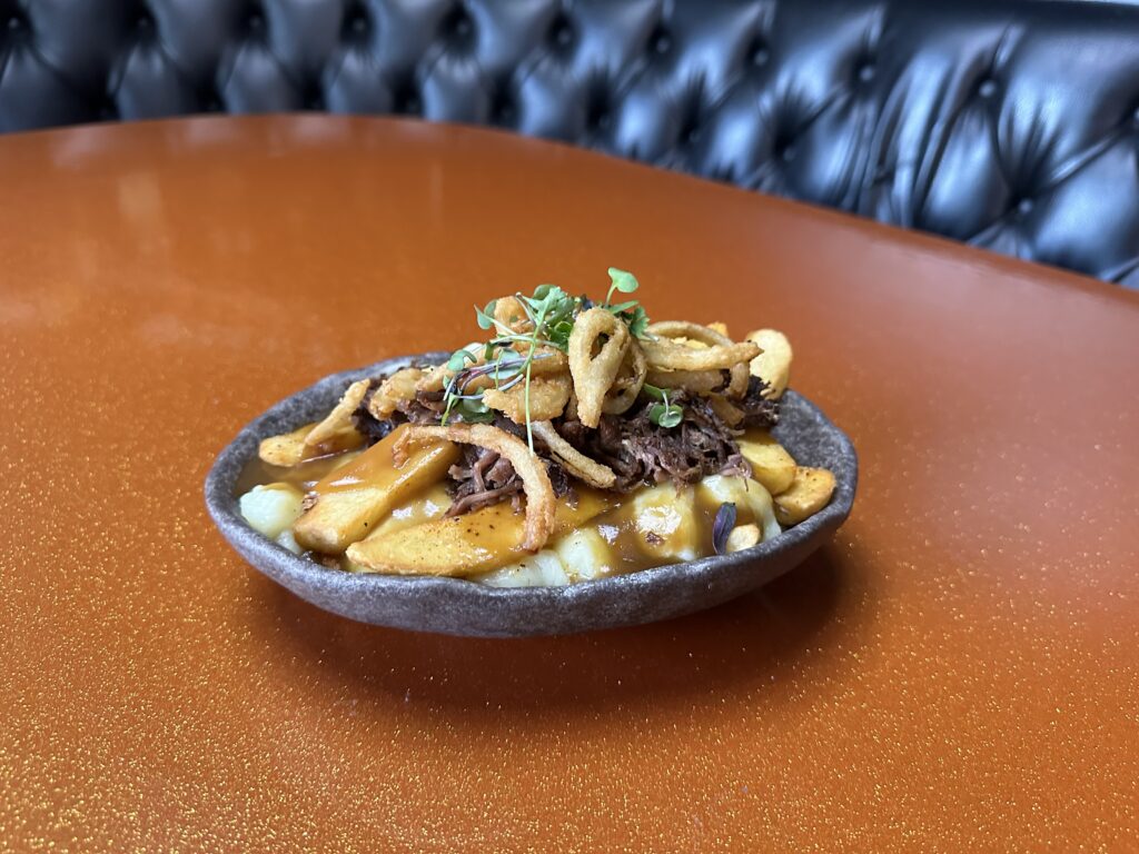 Beef Short Rib Poutine. Photo by Robert Eliason.