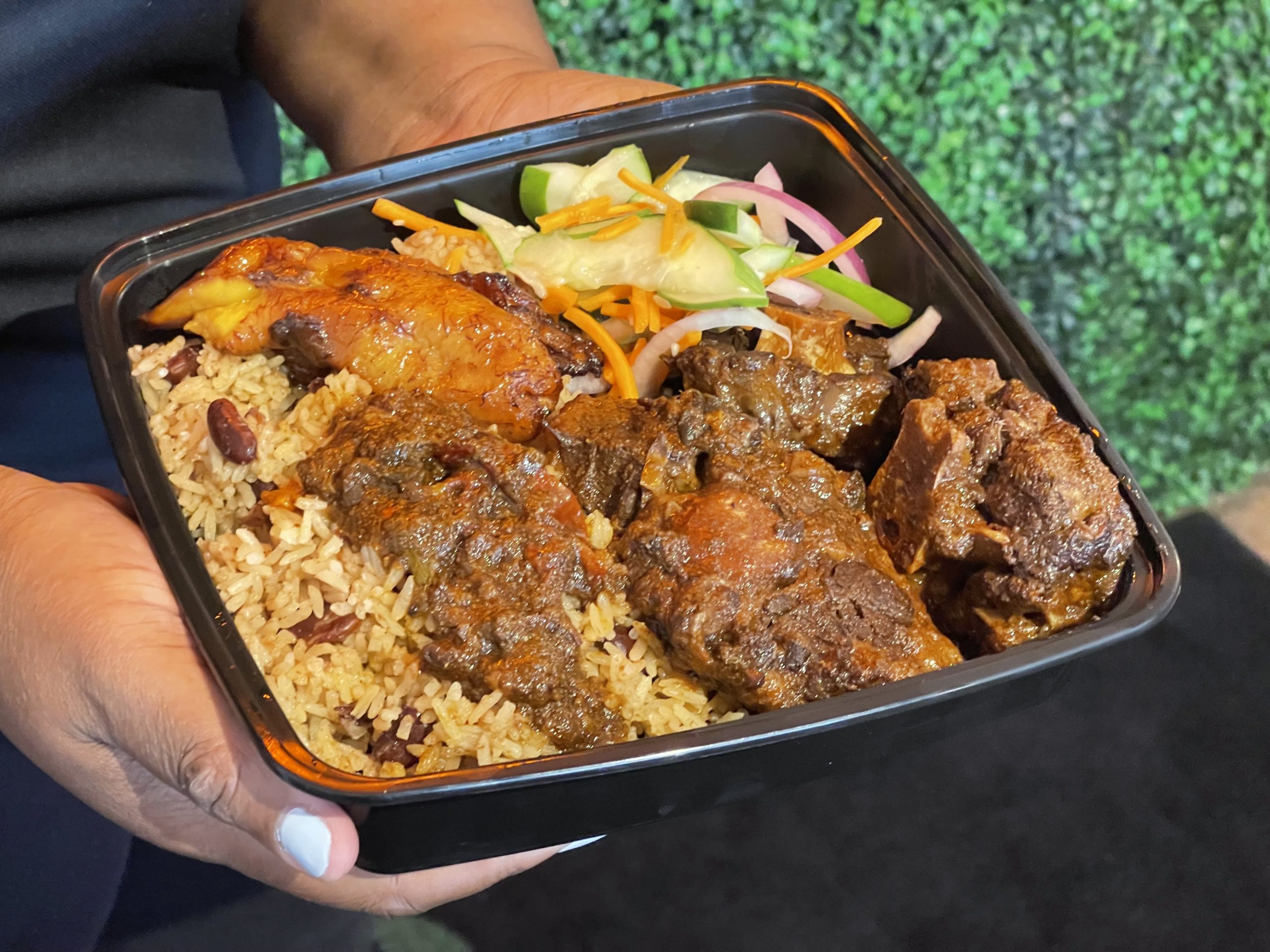 Jamrock - Oxtail with rice. Photo by Robert Eliason.