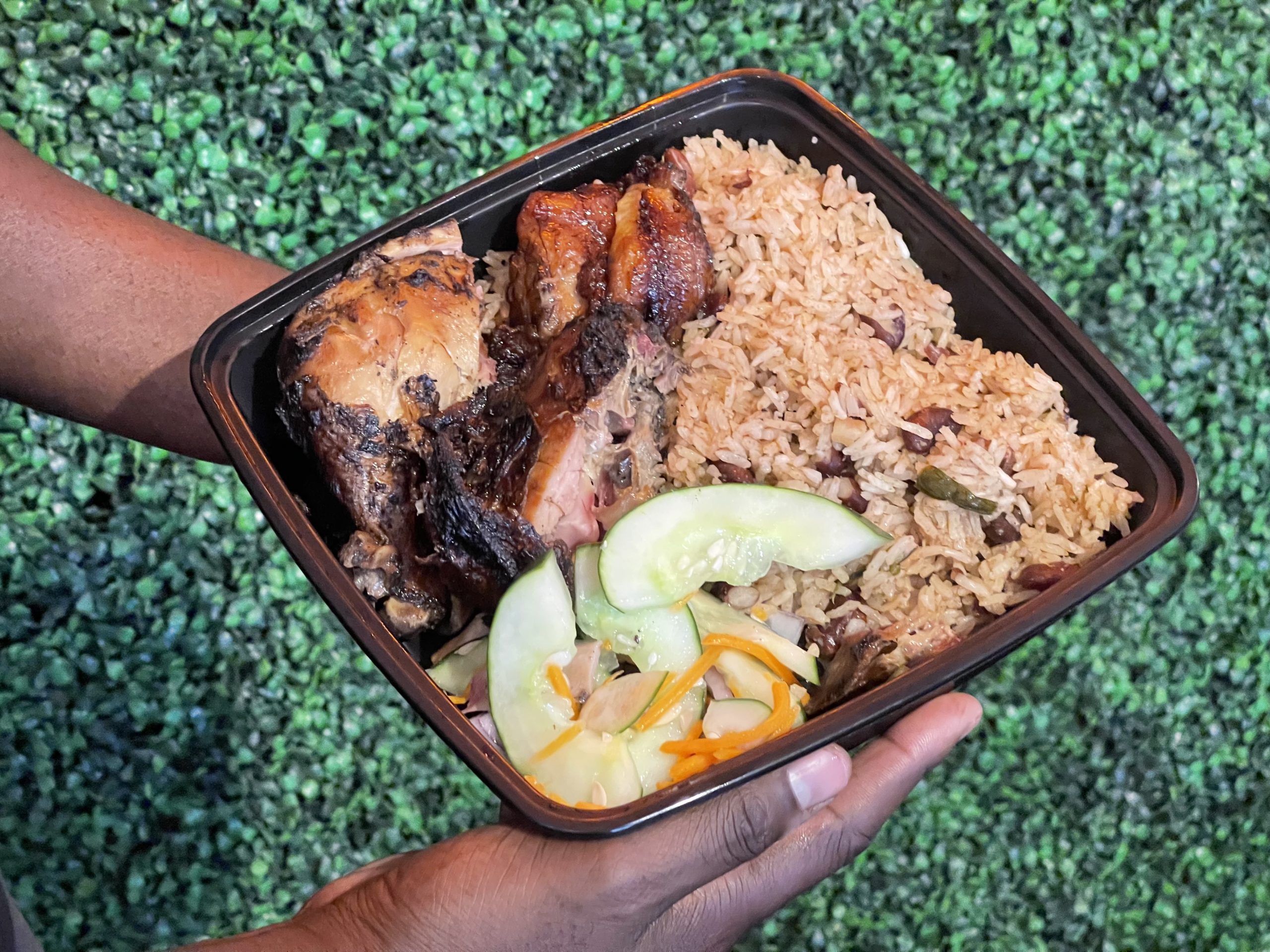 Bold - Jerked Chicken with rice. Photo by Robert Eliason.