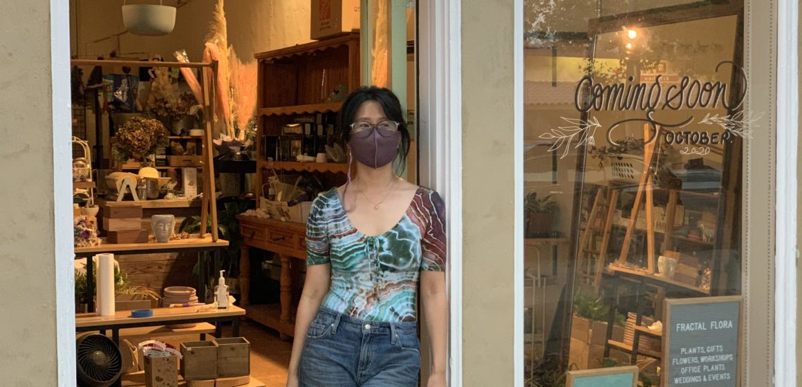 Yuri Kim stands in front of her shop, Fractal Florals, in the Rose Garden District. Kim spent two years as a tenant at Moment in San Pedro Square. She credits the micro-retail space with teaching her the essentials of how to run a business. Photo courtesy of Yuri Kim.